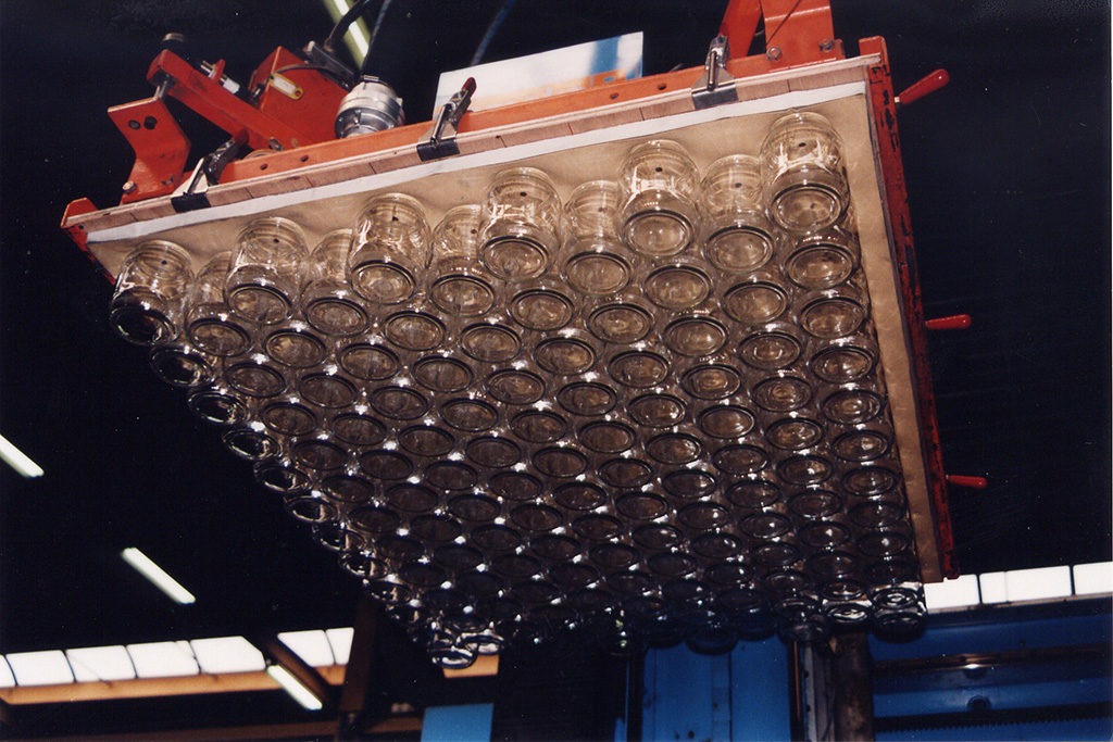 Plaques à vide de préhension de pots